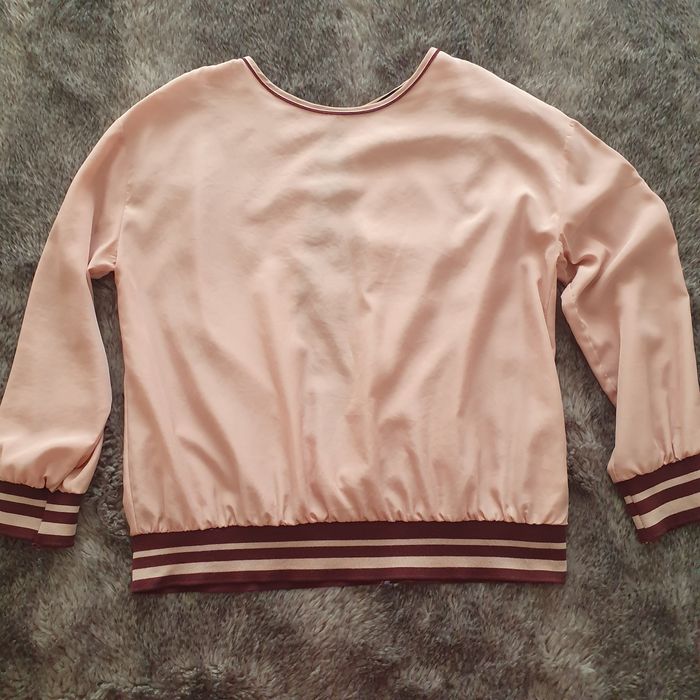 Blusa Zara com abertura atrás.