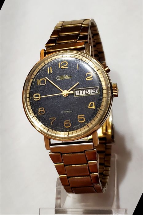 Часы Слава 90х годов в жёлтом корпусе 2428 механизм 26 камней ссср