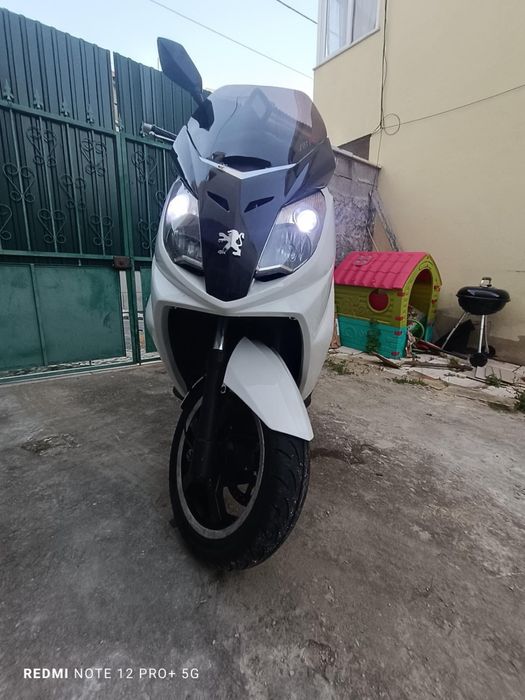 Pegeot satelis 125