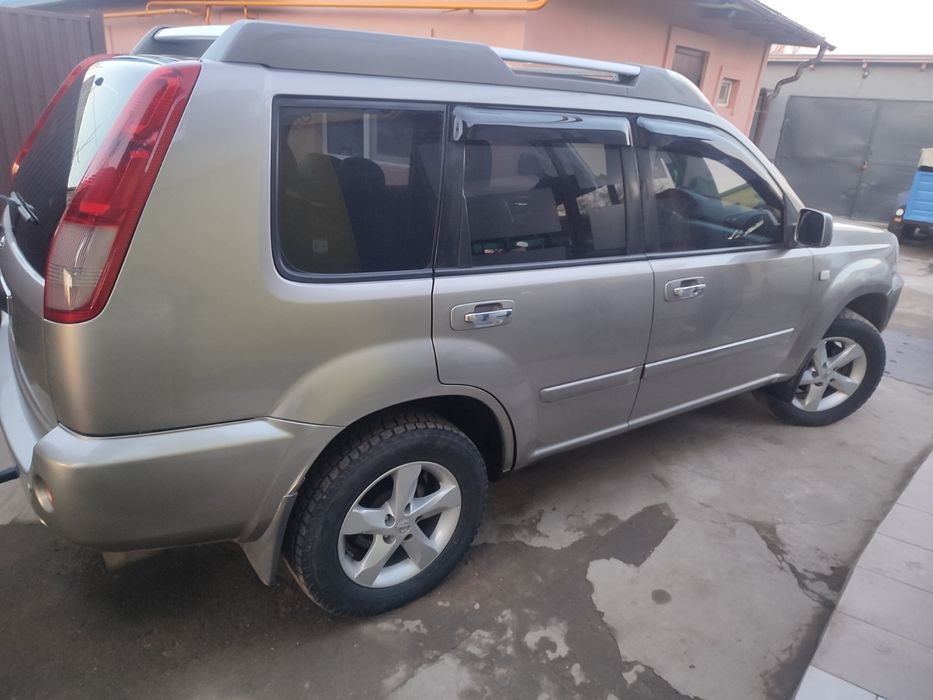Nissan.   X Trail