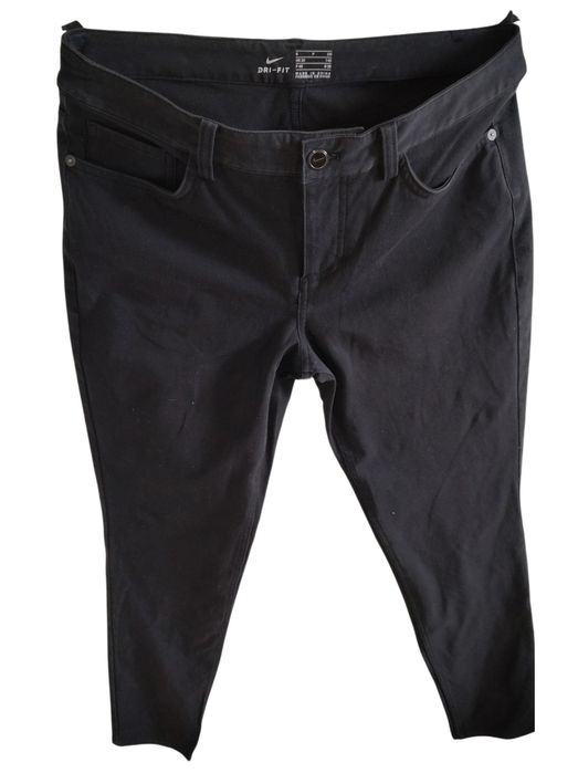 Markowe elastyczne spodnie jeans firmy Nike r 38 M czarne