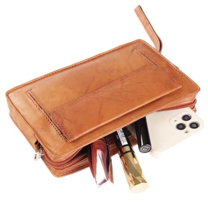 skórzana saszetka męska z paskiem na nadgarstek