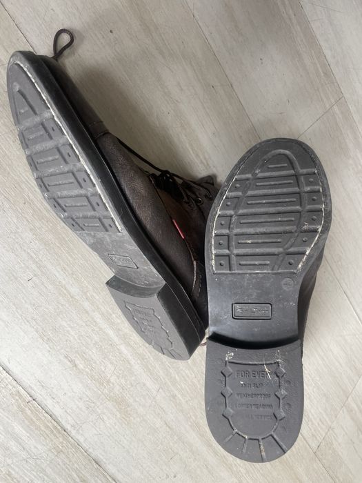 Botas meio cano em couro