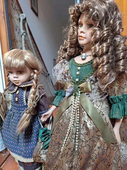 3 bonecas de porcelana