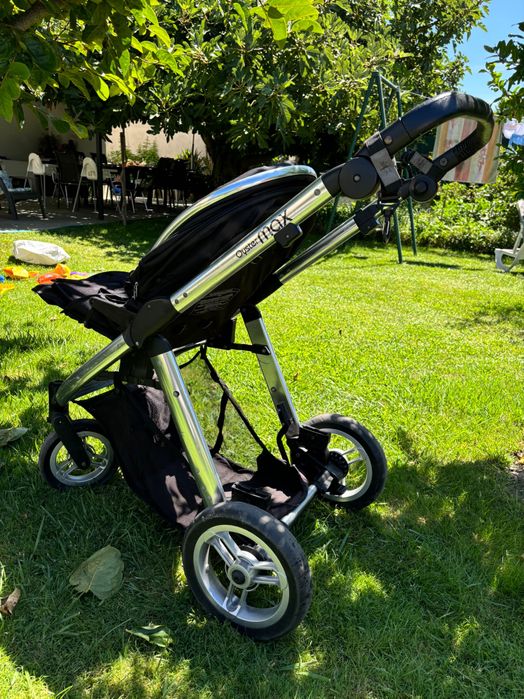 Carrinho com cadeiras e alcofa