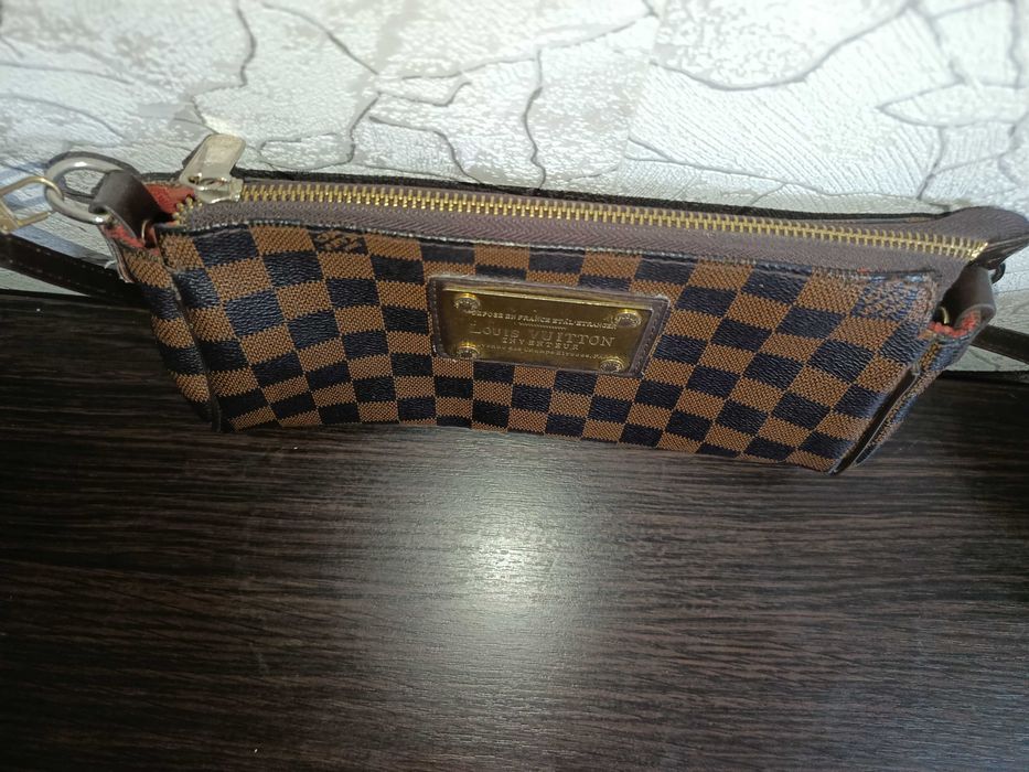 Кожаная сумочка клатч Louis Vuitton