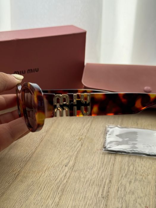 Óculos de sol miu miu