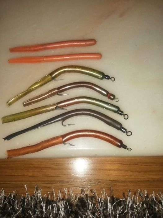 Conjunto vinis de pesca e pingalins