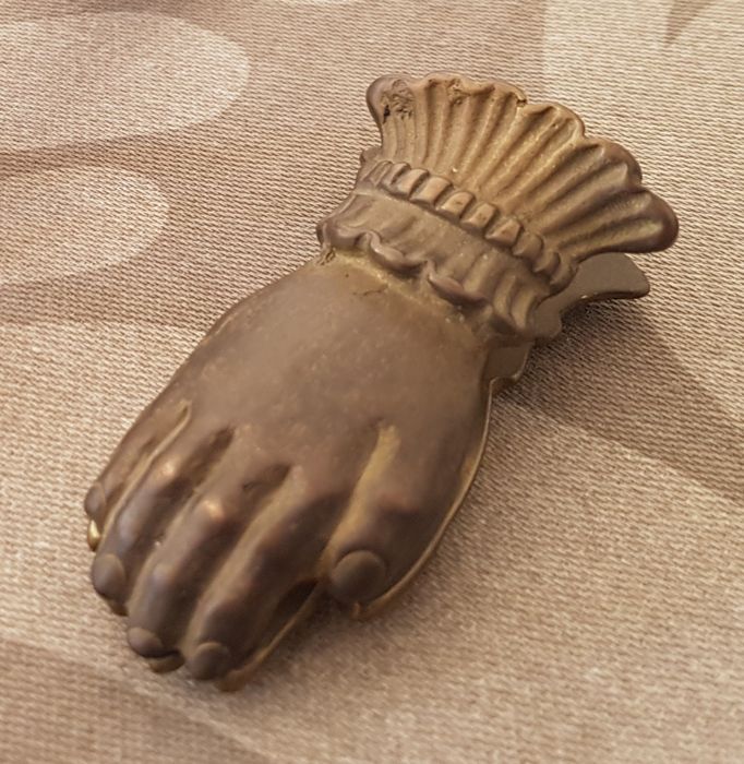 Mola para prender documentos