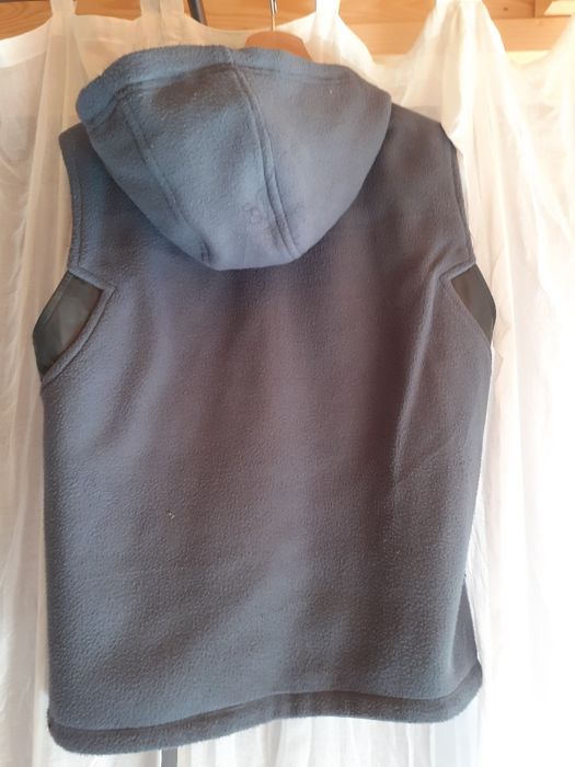 Dwustronna ocieplana damska kamizelka z kapturem