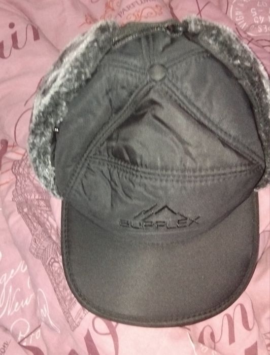 Зимняя шапка закривающим шею