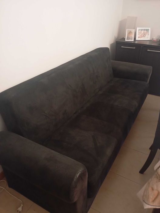Sofá-cama com arrumos