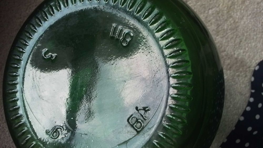 Garrafões de vidro com asa