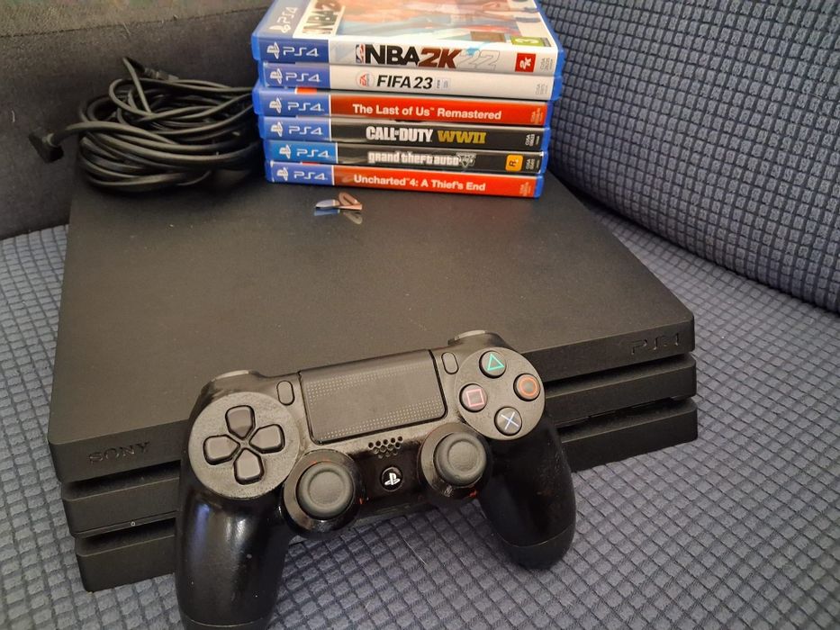 PS4 Pro 1TB + Comando + 6 Jogos – Excelente estado!