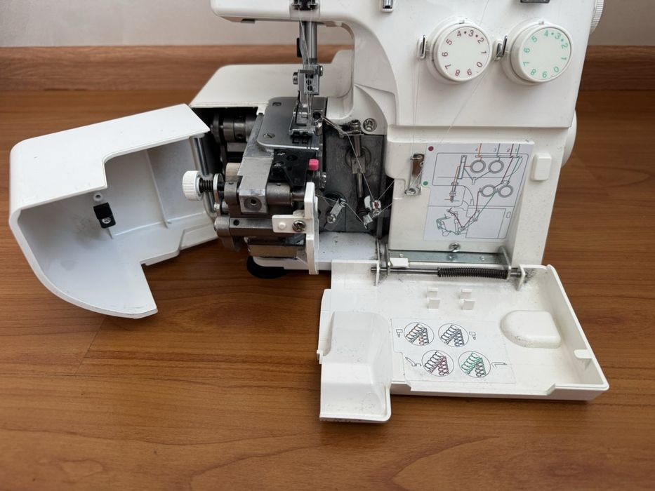 Оверлок Janome 210D
