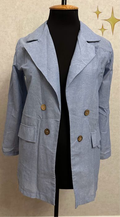 Блакитний льняний костюм