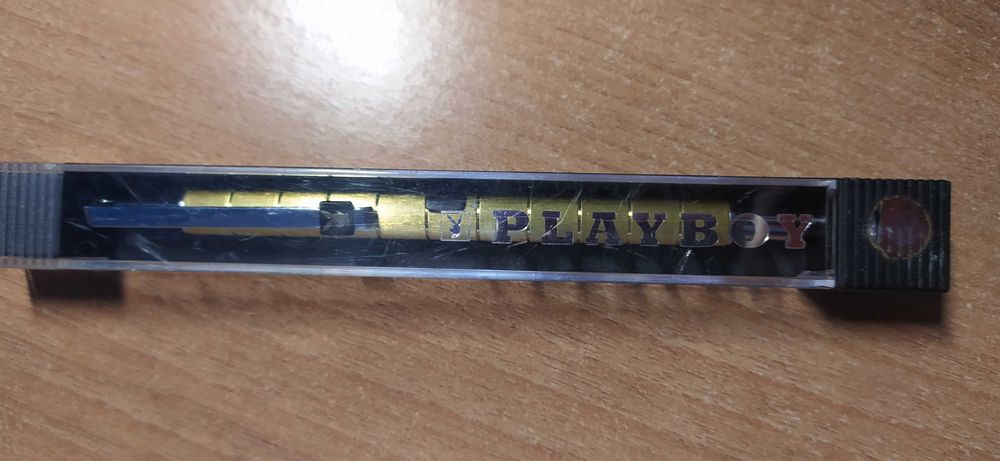 Caneta Playboy dourada
