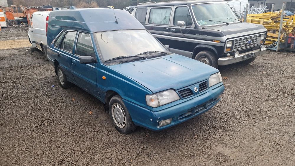 polonez cargo 1.6 silnik skrzynia sanki belka przód tył wahacz zacisk zwrotnica maglownica