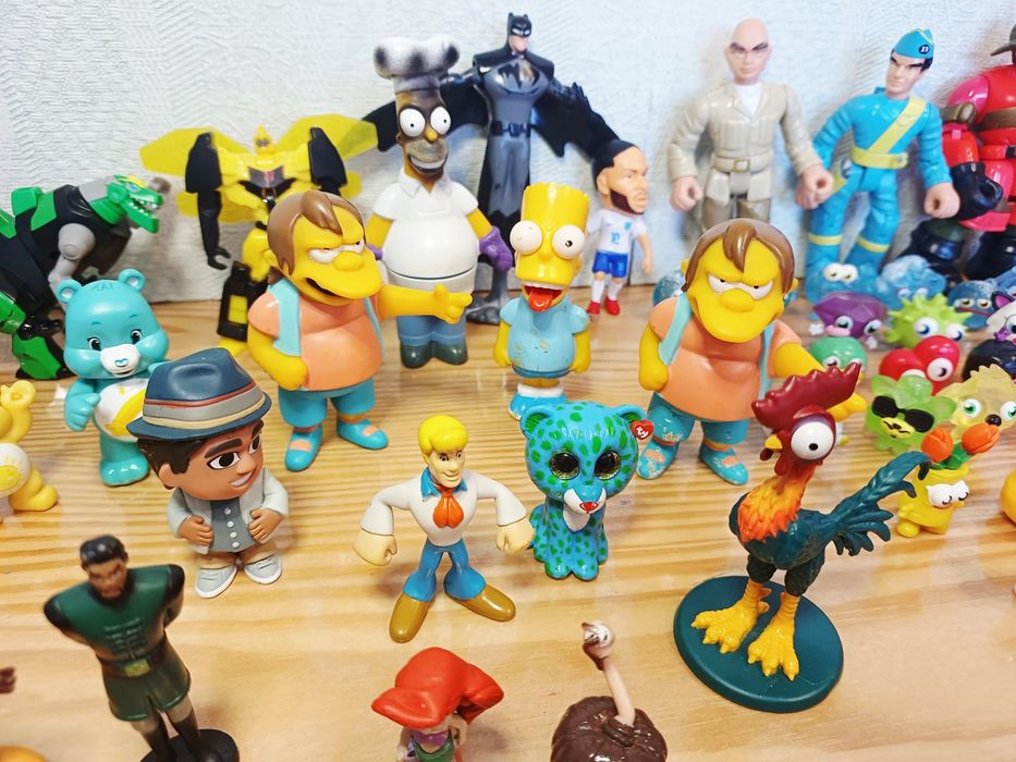 Колекційні фігурки персонажі з Macdonald's Disney Moshi Monsters Playmobil Simpsons