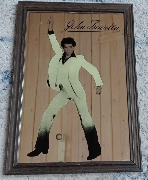 Stare lustro, obraz na lustrze John Travolta.