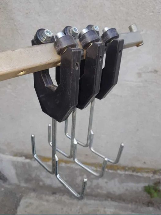 Вешалка на роликах , вешалки на роликах вішаки передвижные крючки