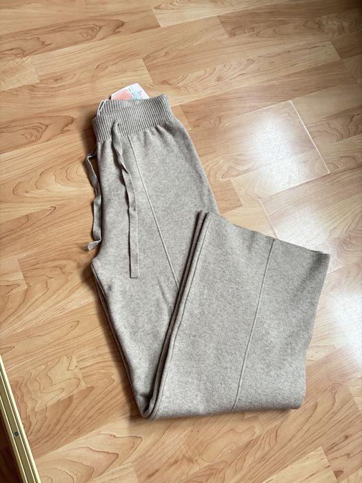 Штани палаццо теплі  бежевого кольору з високою талією