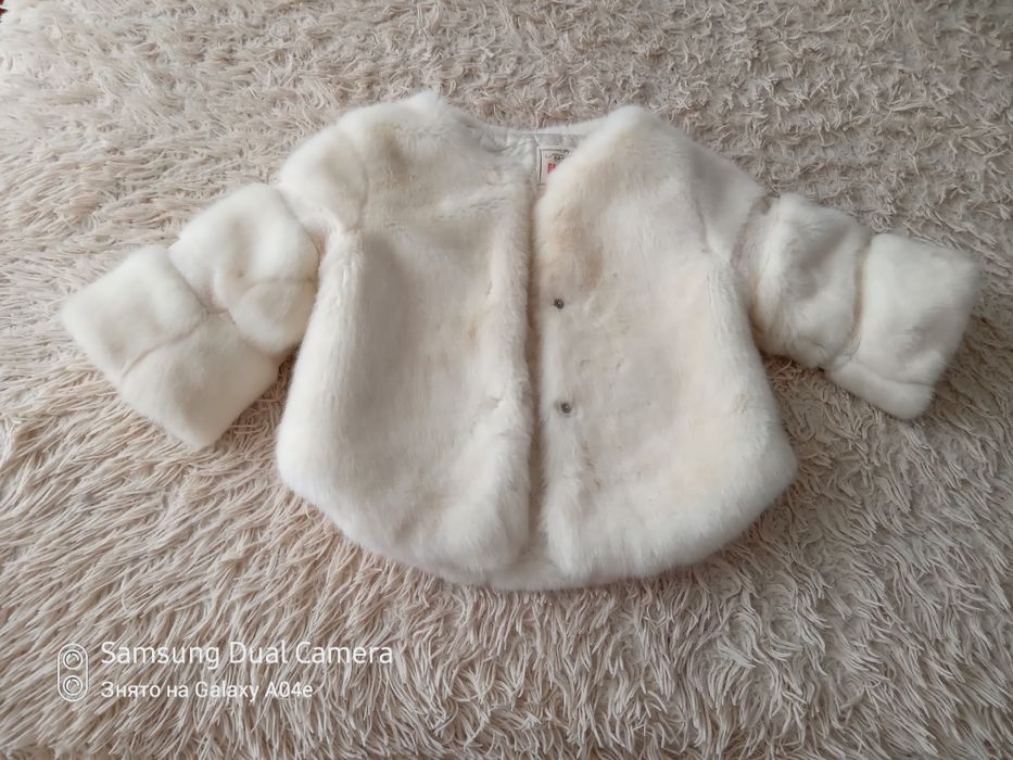 Біленька шубка  для дівчинки