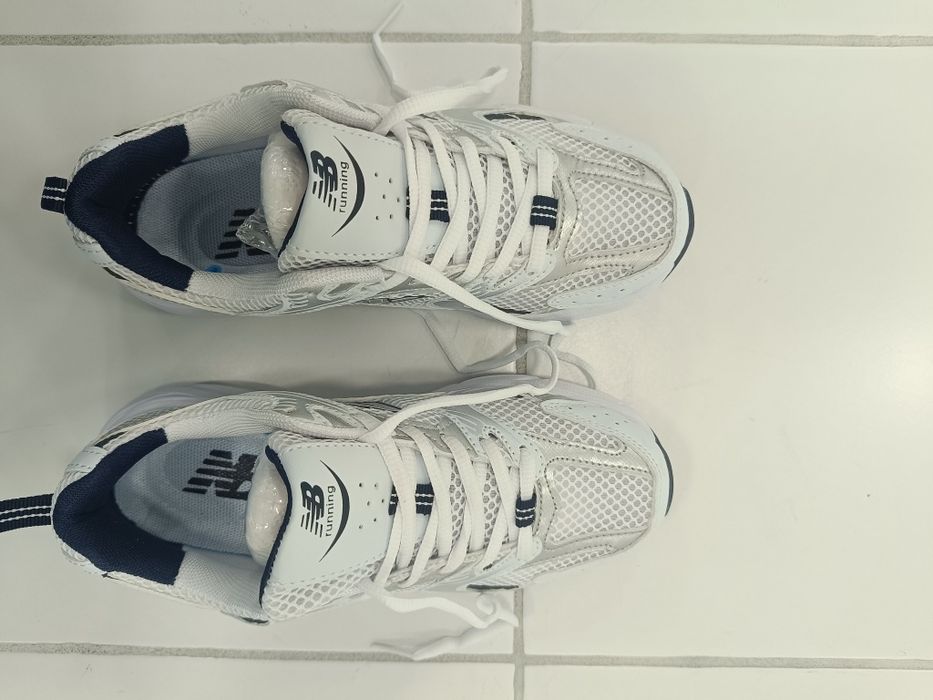 Tênis novos new balance  sem nunca serem usados