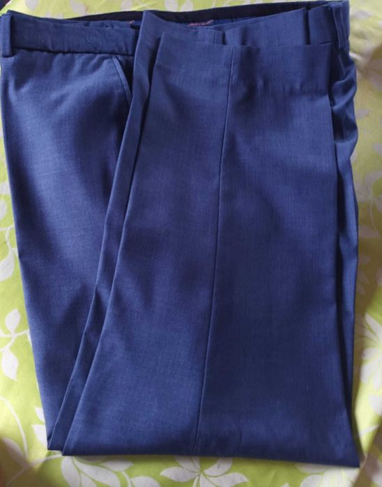 casaco e calças de fato de homem