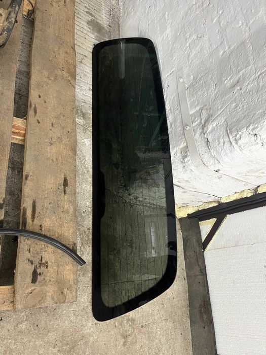Заднє скло заднее стекло кузова  NISSAN NAVARA D40 Ниссан Навара Д40