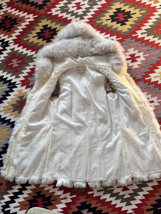 Безрукавка нова