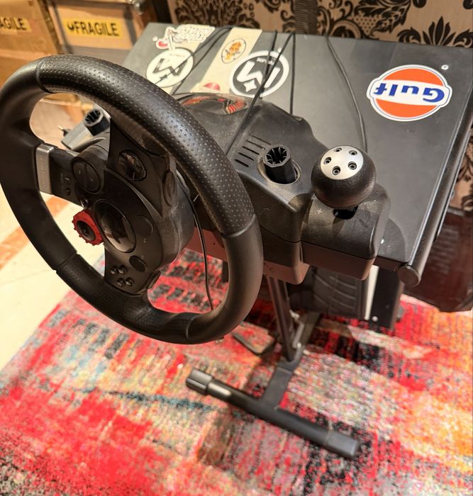 PlayStation 3 c/volante com Pedais 1comando e 31Jogos