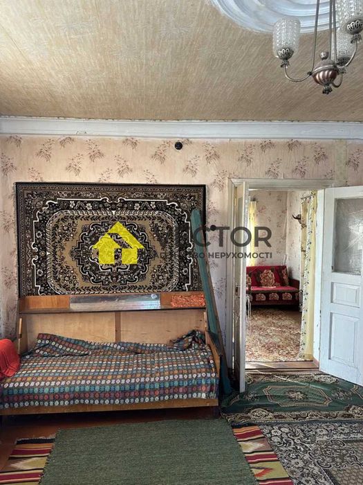 Продам будинок 70 кв.м. з великою ділянкою, гараж, літня кухня