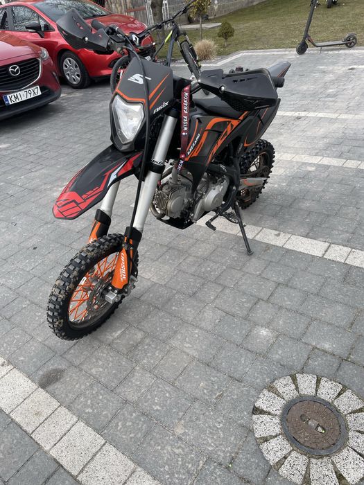 Cross Asix Lizzard  125 cm3 2024- koła 14 na 12 cali
