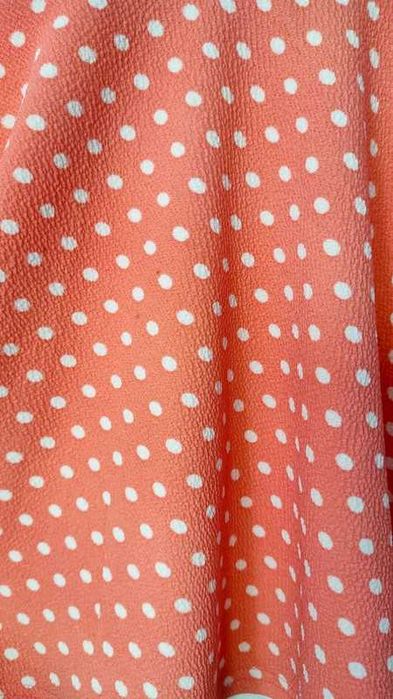Pomarańczowa spódniczka w kropki Sinsay
