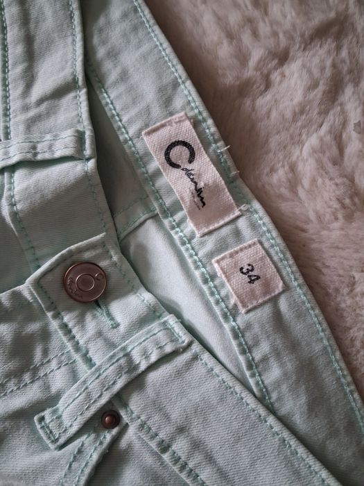 Wiosenne miętowe spodnie jeans rurki slim rozmiar xs. Cubus