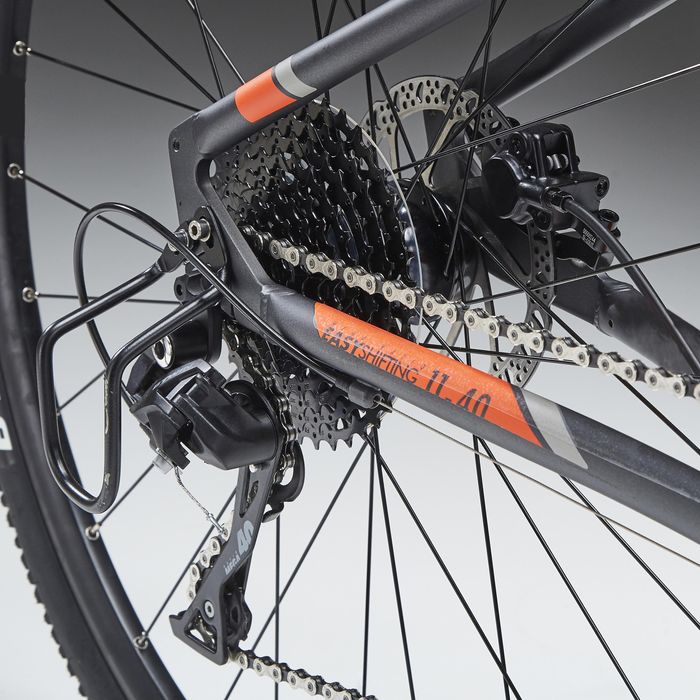 BICICLETA DE TREKKING RIVERSIDE 900 CINZA LARANJA