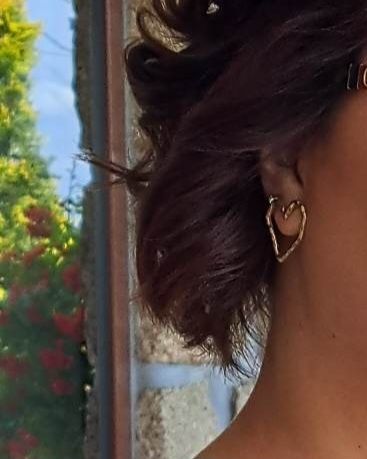 Brincos dourados coração