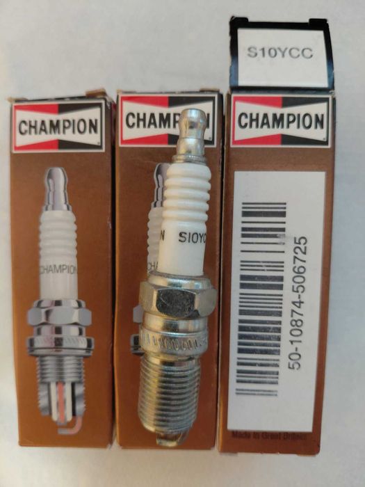 Cвечи зажигания Сhampion .
