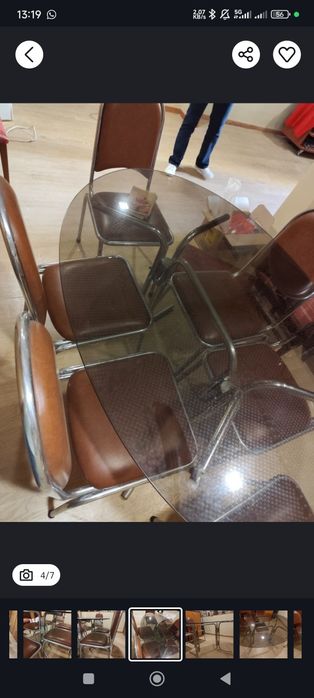 Mesa de vidro oval e 6 cadeiras