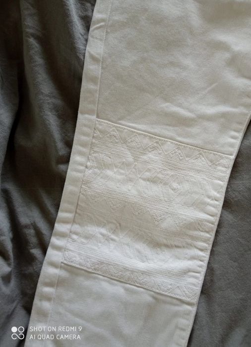 Białe jeansy Zara 36