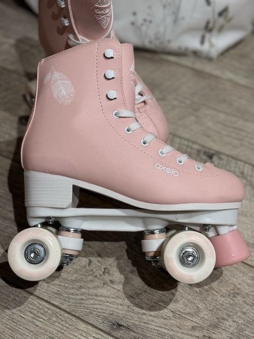Продам Роликові ковзани б/у Oxelo 8503716 рожеві 38р.