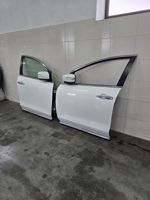 Двері передні-задні Mazda CX7 2007-2013
