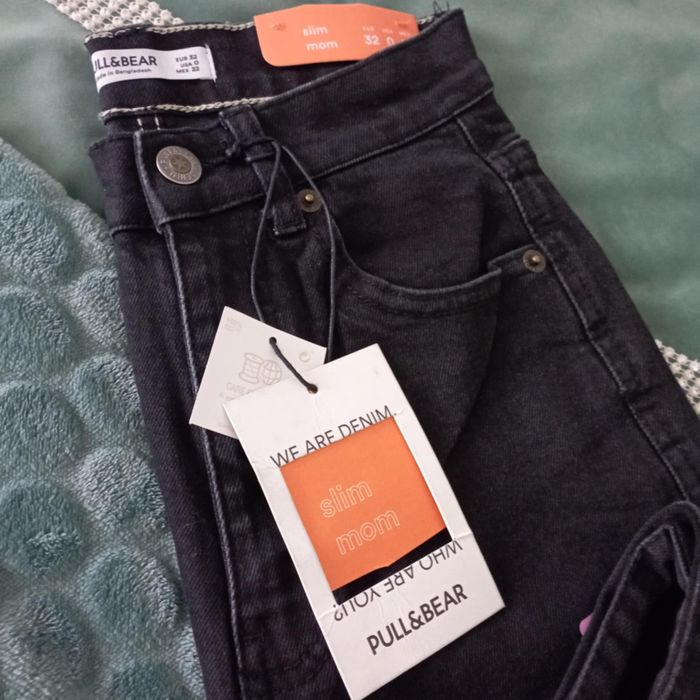 Calças pretas de ganga