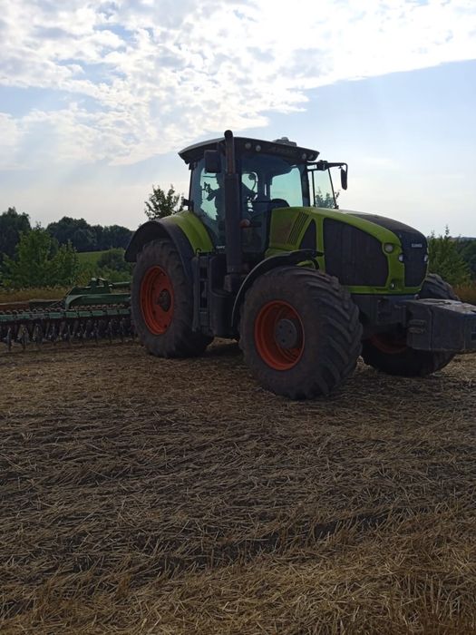 Трактор Claas Axion 950 2012  Продаж