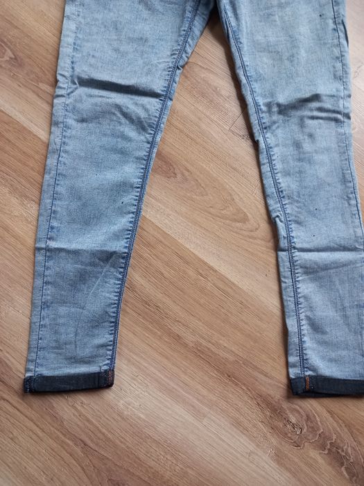 Spodnie damskie jeansy miękkie podwijane nogawki