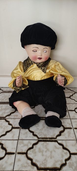 Boneco de porcelana e cerâmica antigo
