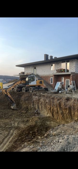 Вантажні перевезення,екскаватор,пісок,щебінь,трал,робота