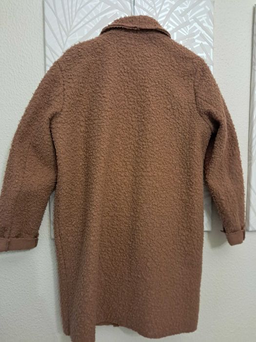 Casaco comprido de senhora