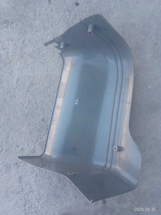 Acabamento lateral do banco direito Ford Transit 1991-1994 (92VB-V600K65-BEW)